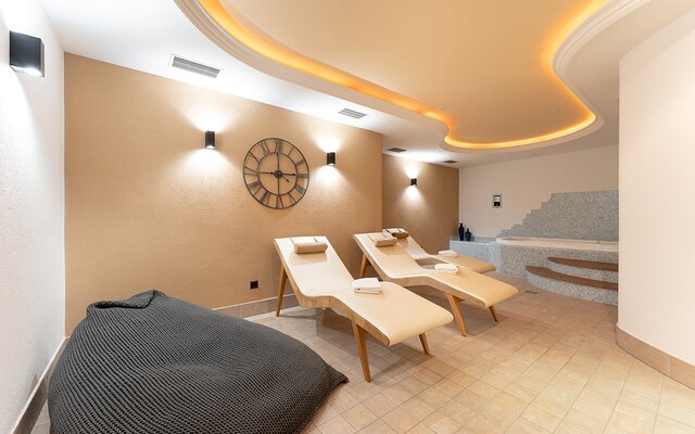 Spa with relaxation loungers and a wellness area.